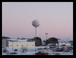 Augusta Watertower December 28 2009 at 4:41 PM Sunset was at 4:32.  The light softens from the east to west as the sun heads for its winter nighttime hiding